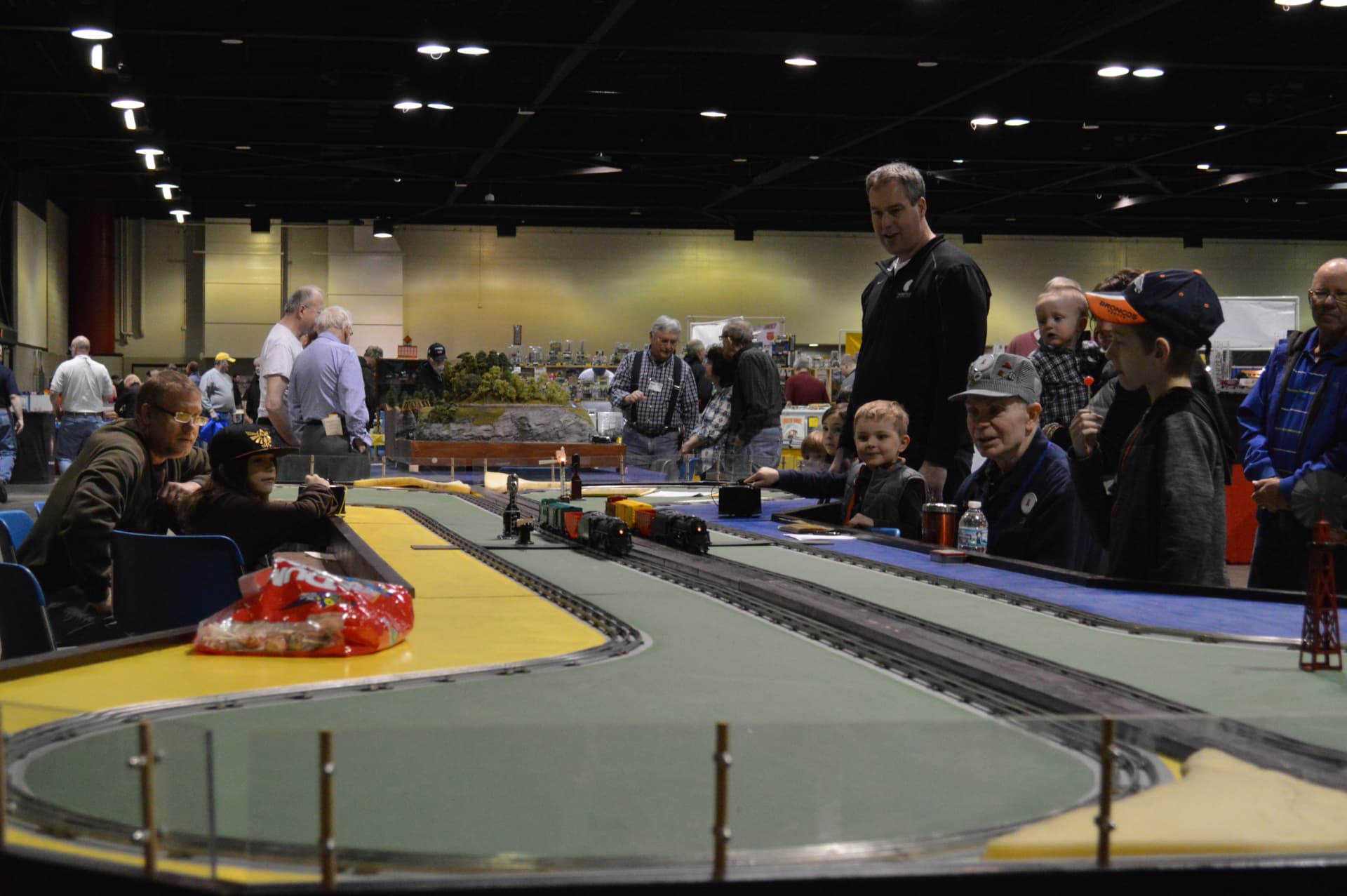 Families operating trains at the show